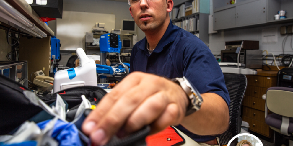 Biomedical engineer repairing a medical device