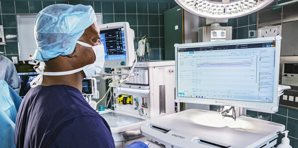 Clinician looking at a screen in the OR