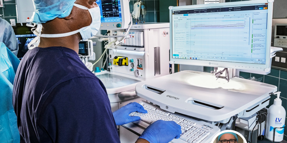 Clinician looking at a patient results in a computer 