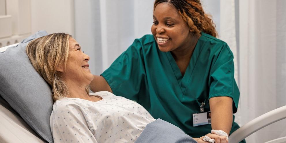 Clinician with patient on the ward