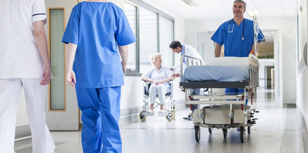 Clinicians in a hospital corridor