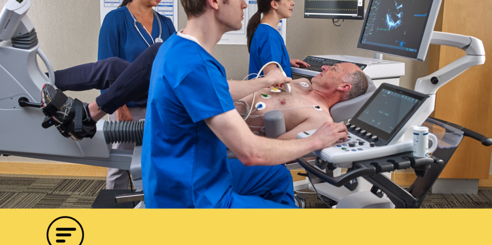 Clinicians performing an ultrasound and an ECG to a male patient