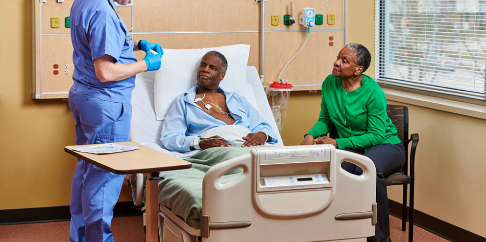 Male patient in the ward with Portrait Mobile