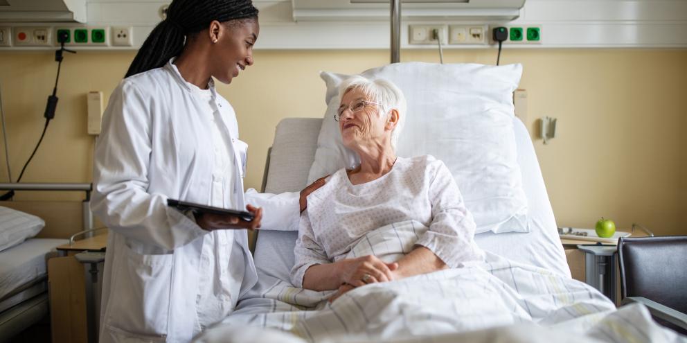 Nurse taking care of an elder woman