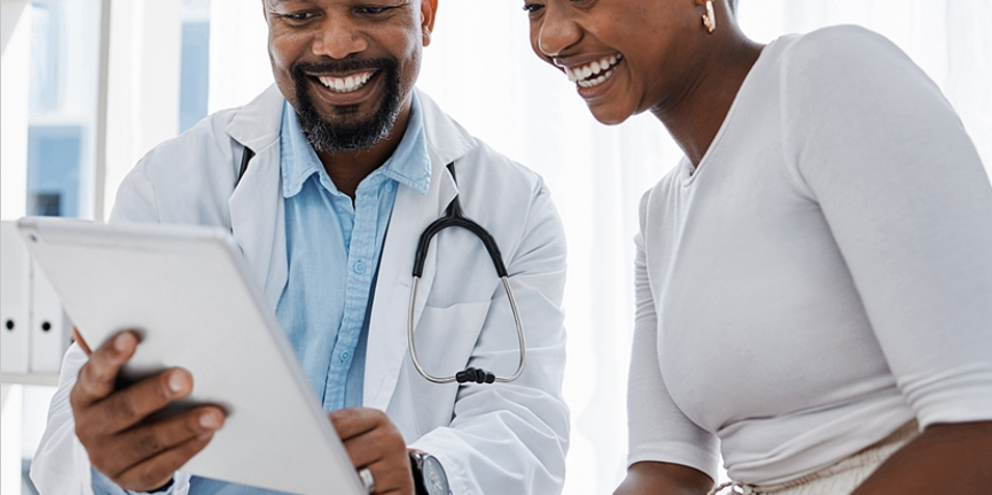 Patient and doctor looking at test results