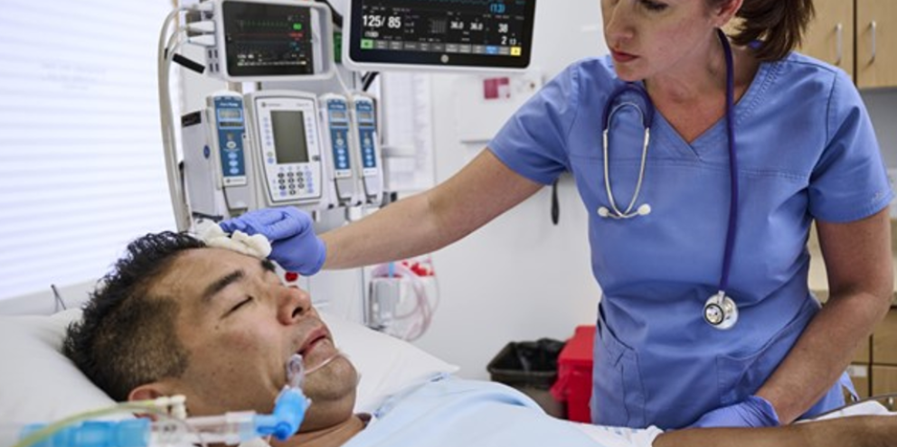 Patient in the ER being checked by a clinician