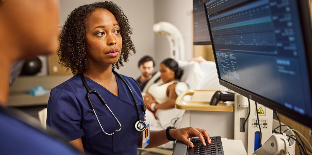 Clinician looking at a monitor