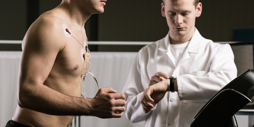 Man running on a treadmill doing a stress test ECG