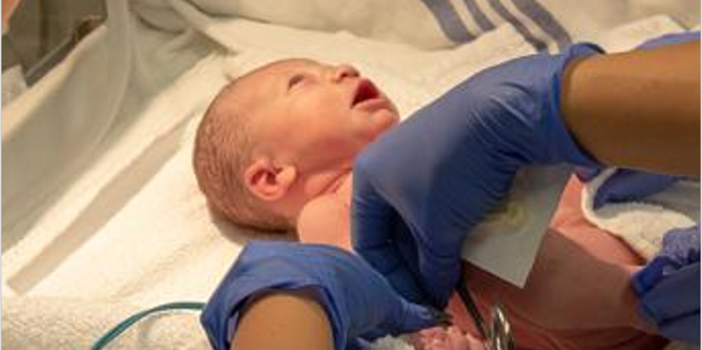 Infant patient on an incubator