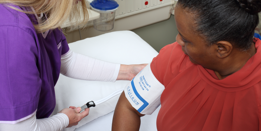 Clinician placing a Soft Cuff on a patient