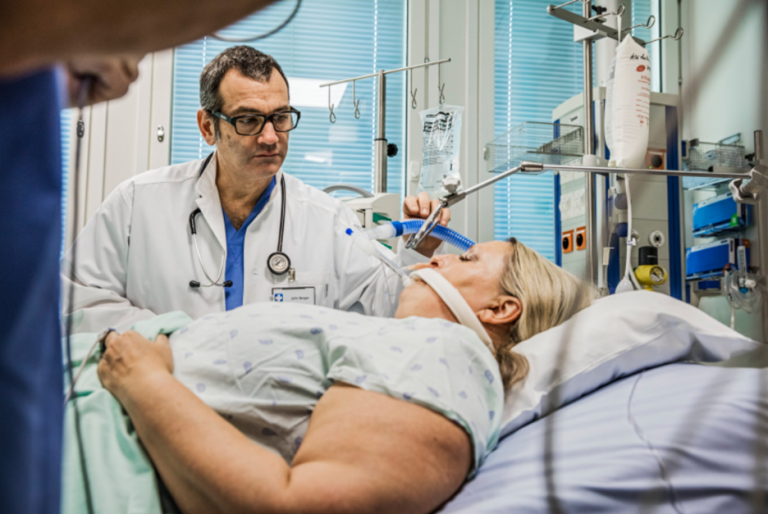 Clinician taking care of a obese patient