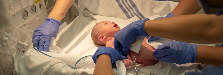 Pediatric patient on an incubator