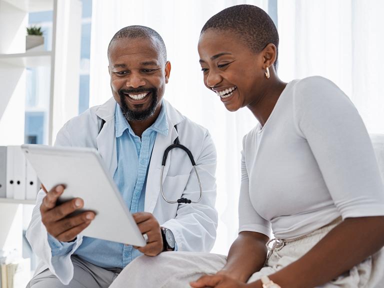 Patient and doctor looking at test results