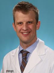 Dr. Adam May