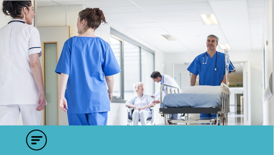 Clinicians in a hospital corridor