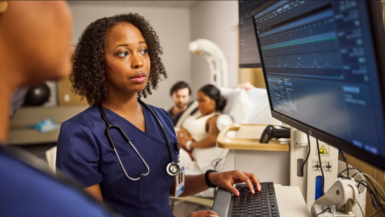 Clinician looking at a monitor