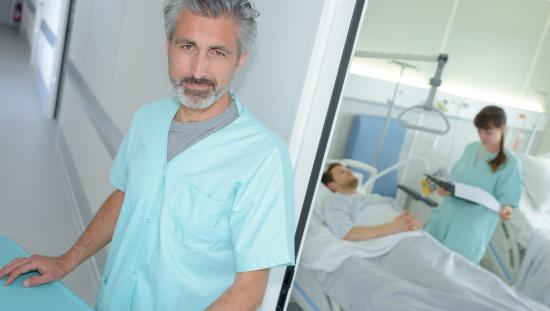 Clinicians taking care of patient in critical condition post-operatively