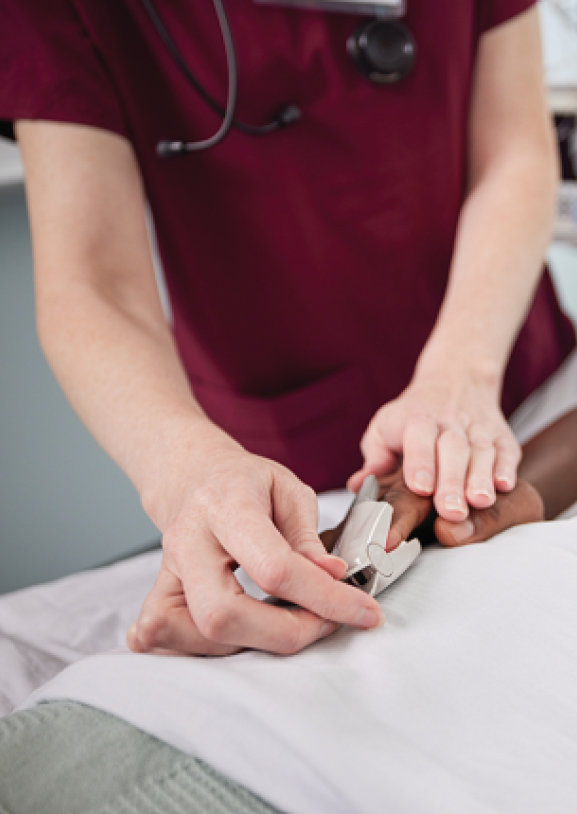 Nurse with an ICU patient